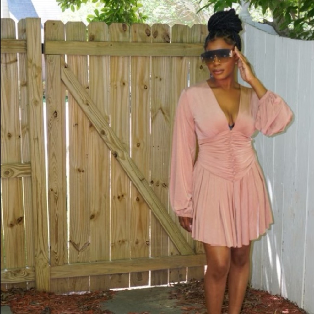 This dress is a must. It fits the body well and compliments your silhouette.